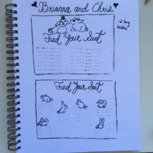 image of sketchbook containing rough sketch of seating chart painting design