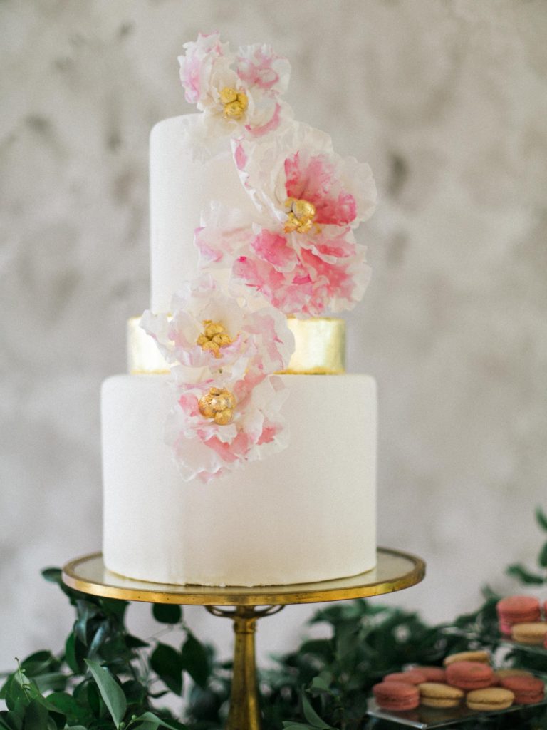 white wedding cake with pink and gold sugar flowers by catherine george cakes