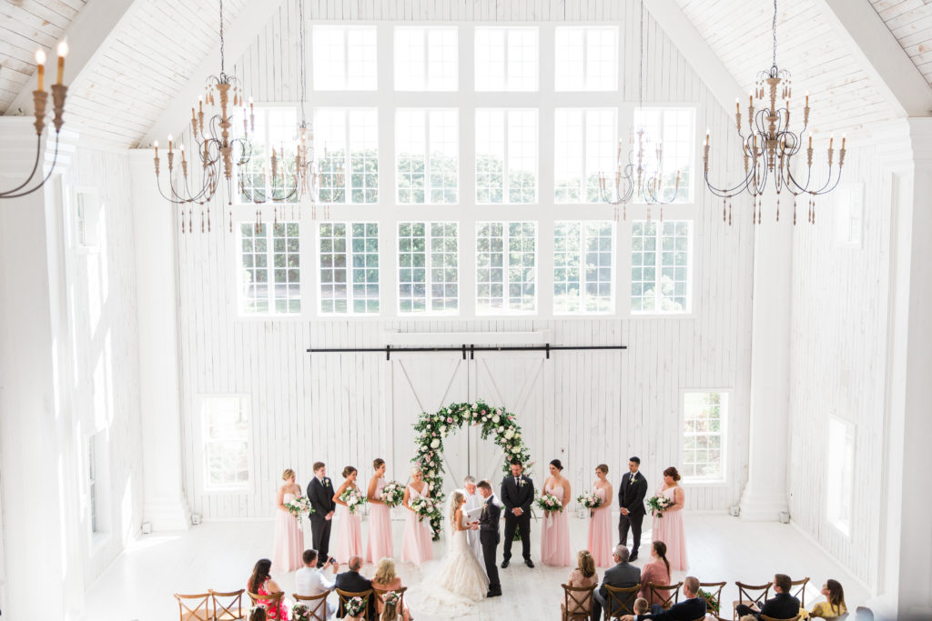 A bride and groom's ceremony at the White Sparrow Barn
