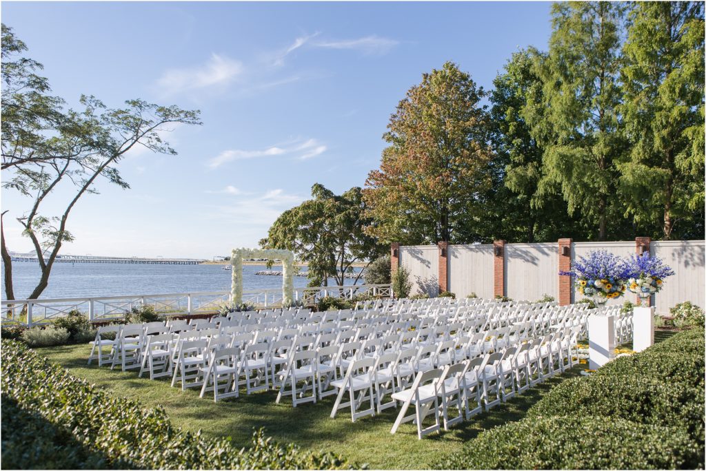 Summer wedding at Chesapeake Bay Beach Club. Live wedding painting By Brittany Branson.